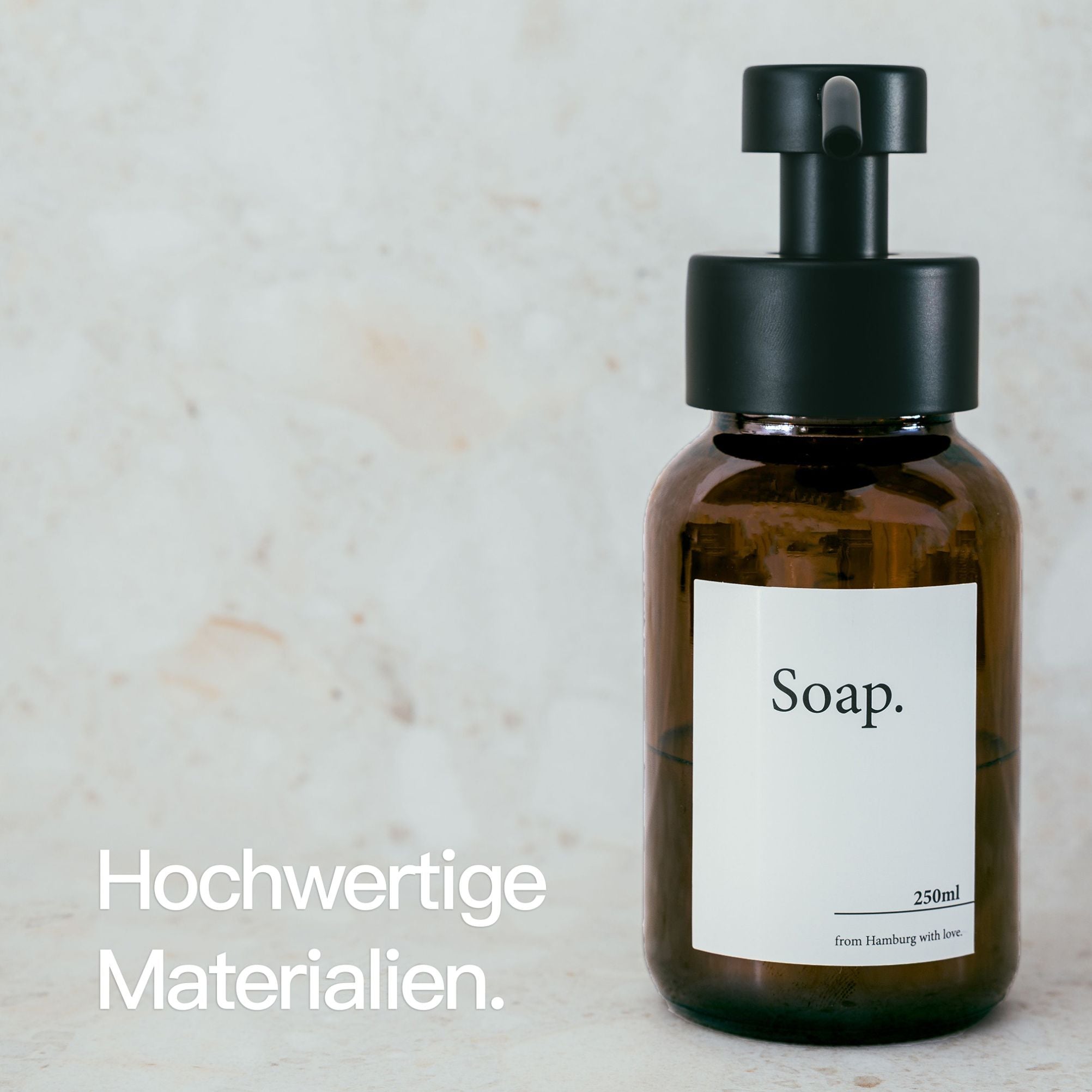 Designfabrik Hamburg Glas Seifenspender mit Gummistandfuß und Edelstahlpumpe schwarz Braunglas