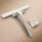 Anzeige_Render Designfabrik Hamburg Duschabzieher aus Silikon mit selbstklebender wall mount und Hängehalterung weiß matt