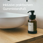 Designfabrik Hamburg Glas Seifenspender mit Gummistandfuß und Edelstahlpumpe schwarz Braunglas