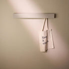 Designfabrik Hamburg minimalistische Garderobe mit versteckten Haken für den Flur Beige