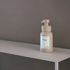 Designfabrik Hamburg Seifenspender aus Edelstahl und Glas mit Gummistandfuß beige 